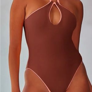 Becca, modern Edge Hi-Neck one piece swimwear.